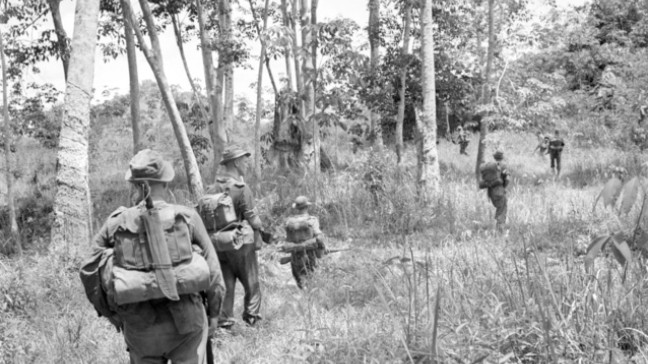 Malayan Emergency - soldiers patrolling jungle - AWM HOB/56/0495/MC