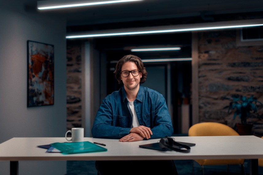 A man sitting at his desk